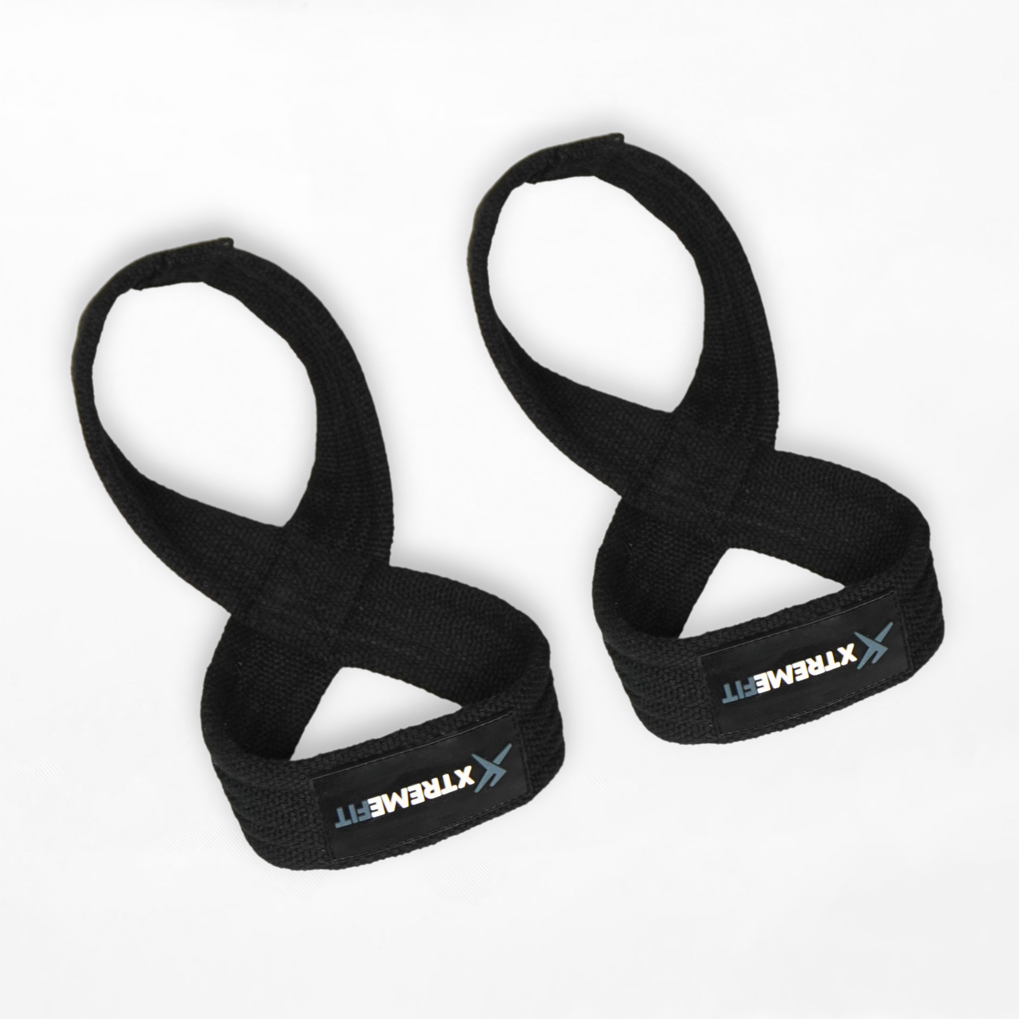 Sangles de muscu 8 xtremefit au sol. Idéal pour soulager le gripp et les avants-bras en muscu, powerliting, haltérophilie. Fabriqué en coton renforcé
